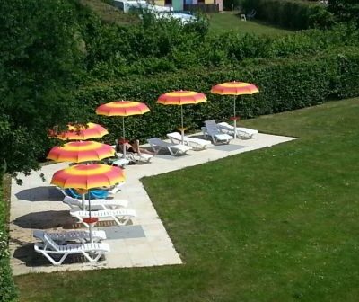 Ligstoelen met parasol